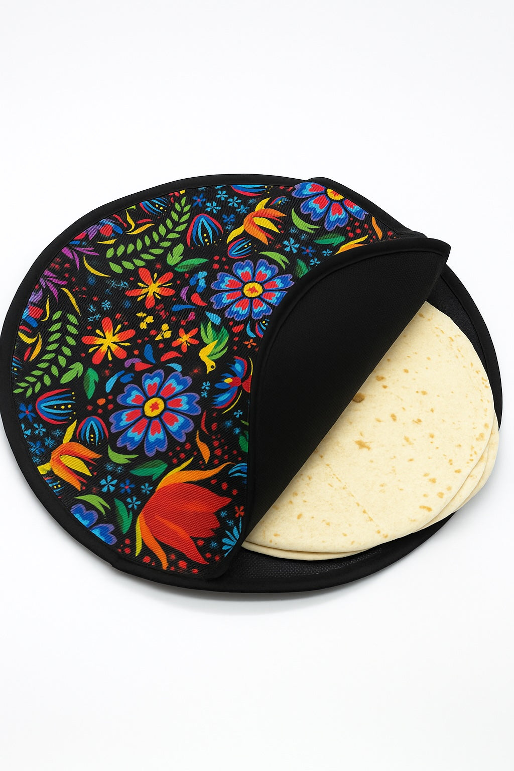 Colorful tortilla holder with floral design containing tortillas on a white background